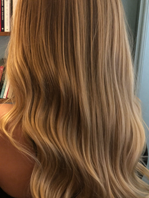 Healthy blonde hair from behind